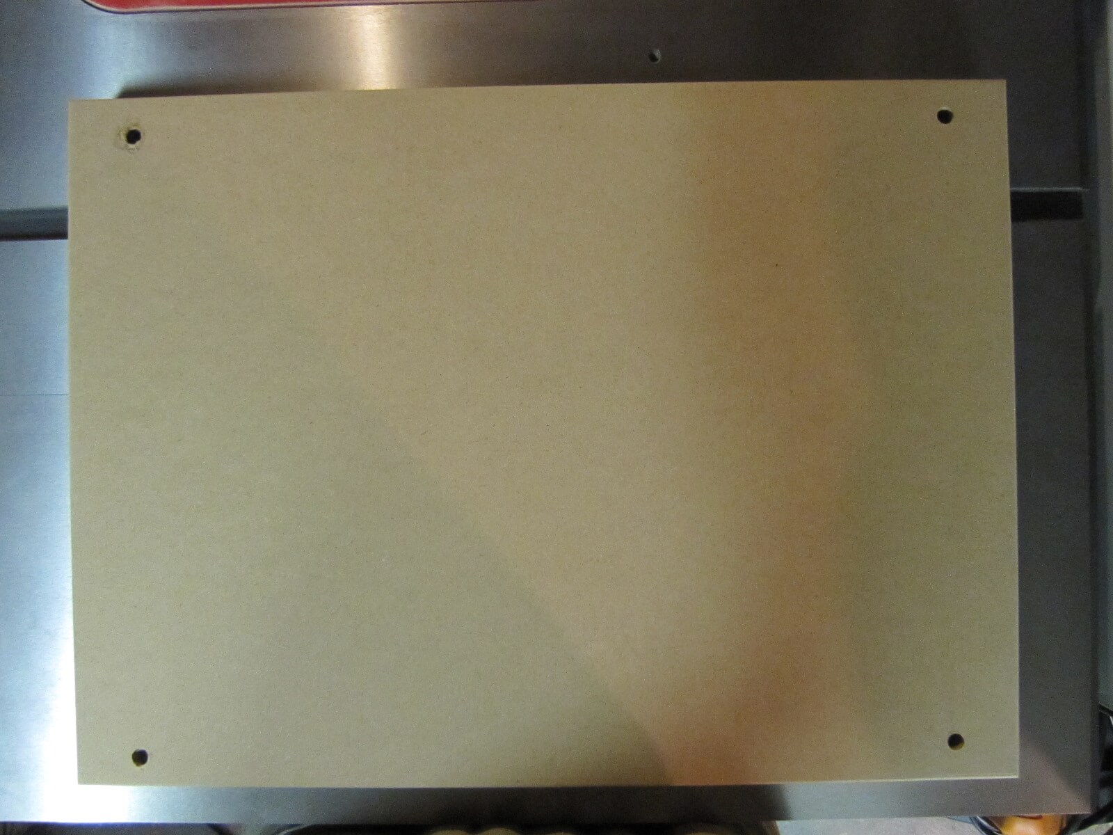 The drilled MDF surface